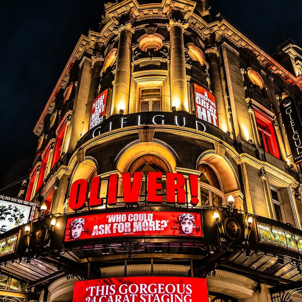 External view of Gielgud Theatre with Oliver! signage