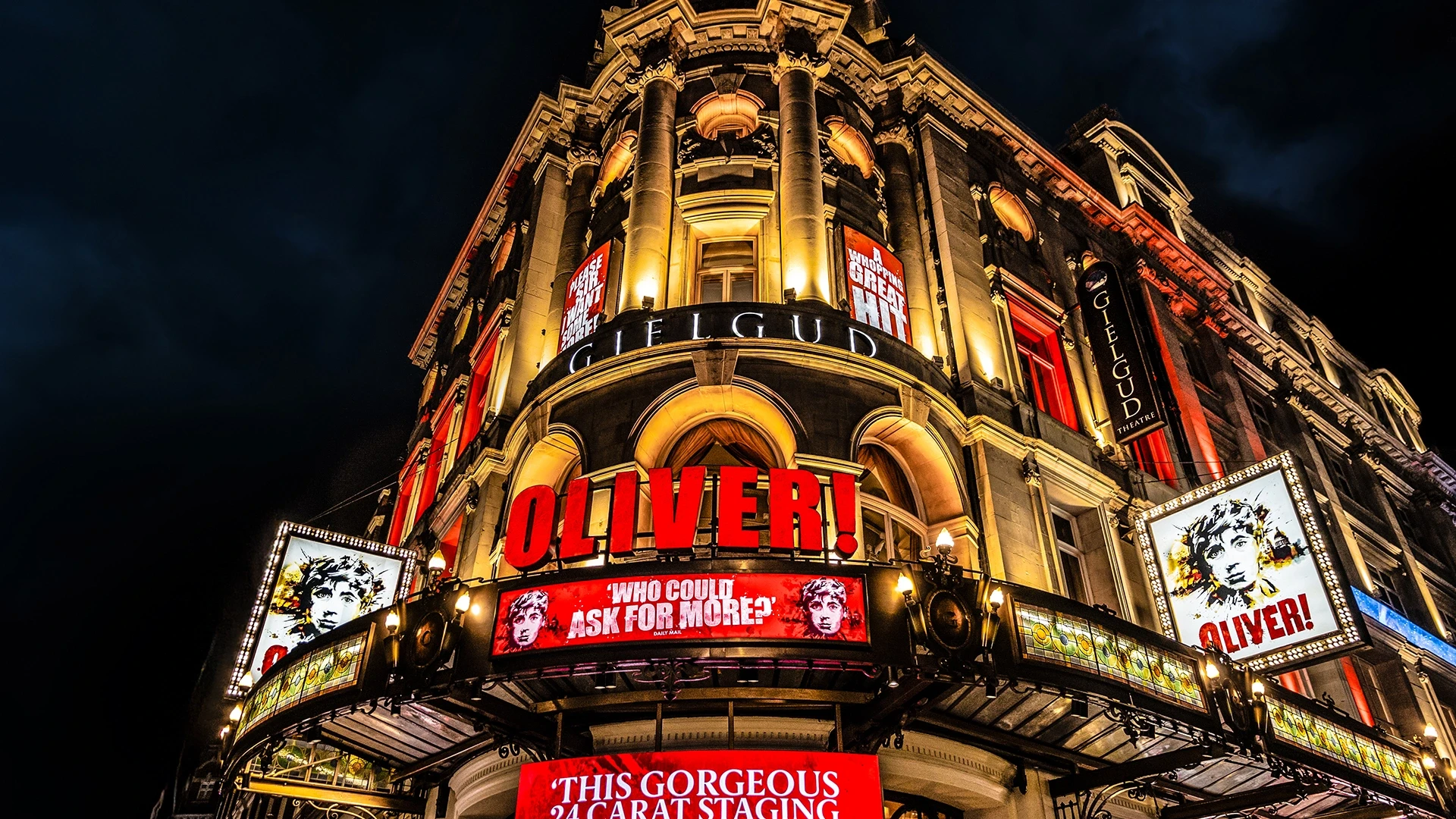 External view of Gielgud Theatre with Oliver! signage