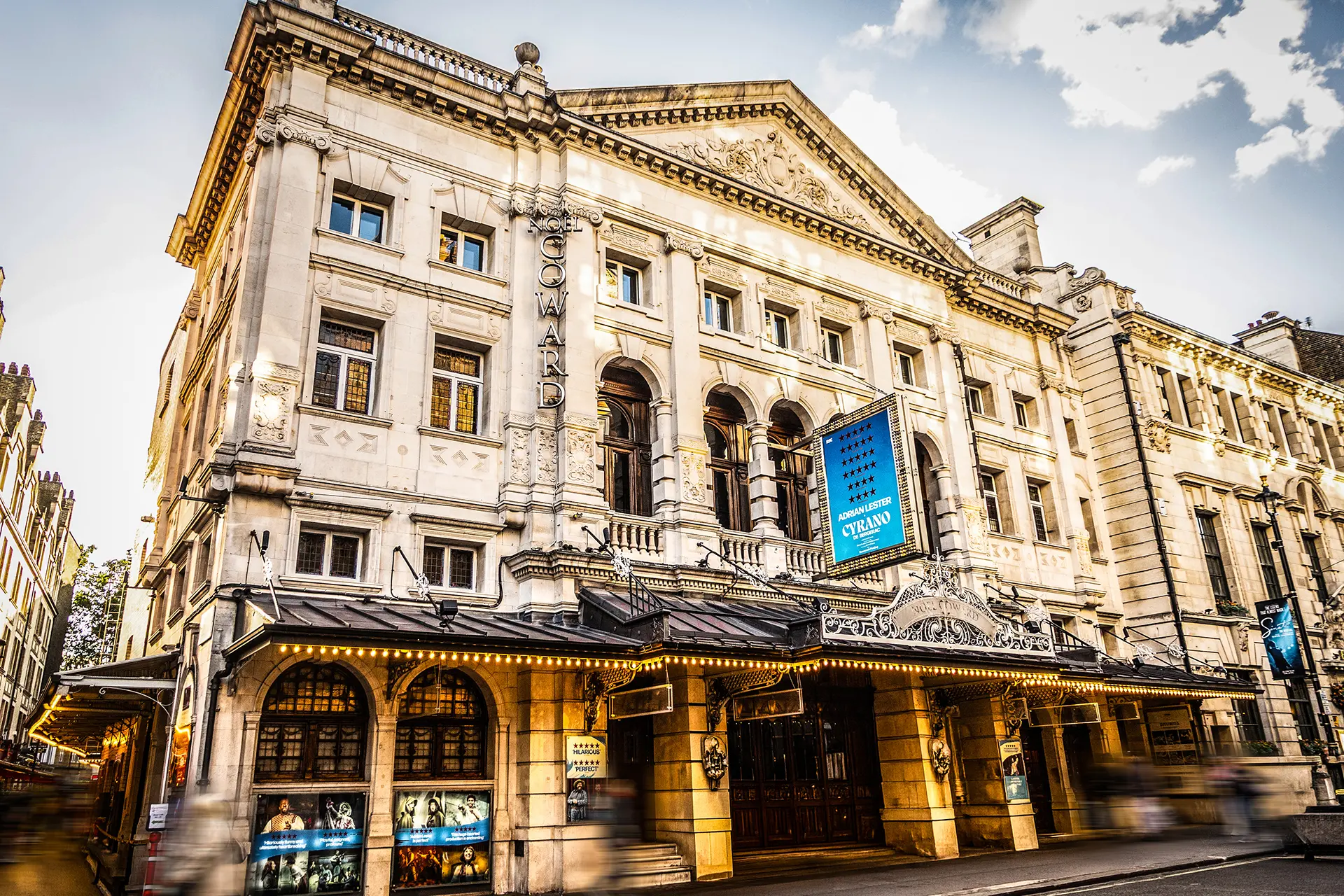 Noël Coward Theatre exterior with Cyrano de Bergerac signage
