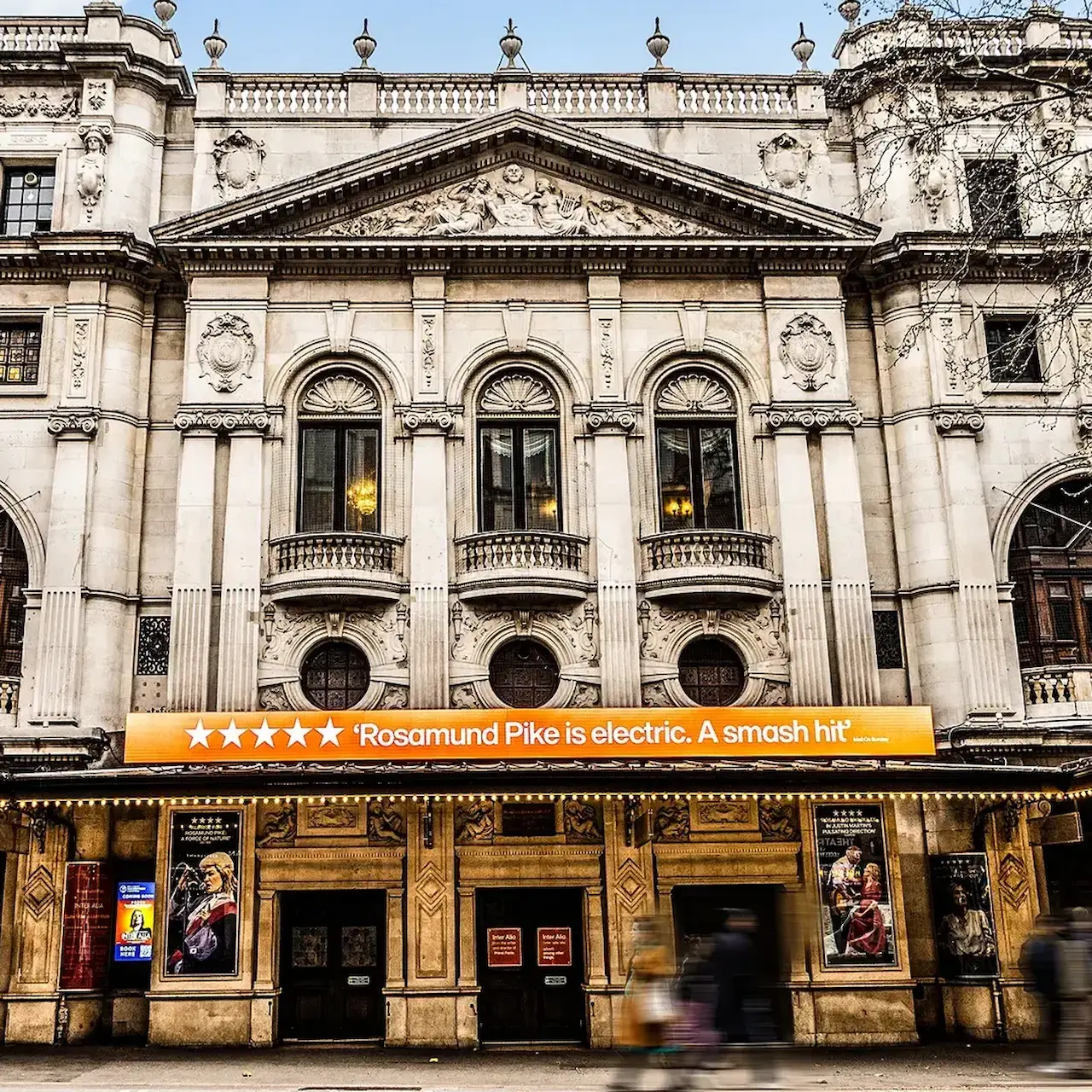 External view of Wyndham's Theatre with Inter alia signage