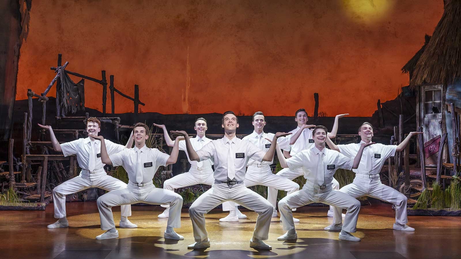 The Book of Mormon London Company. Photography by Johan Persson