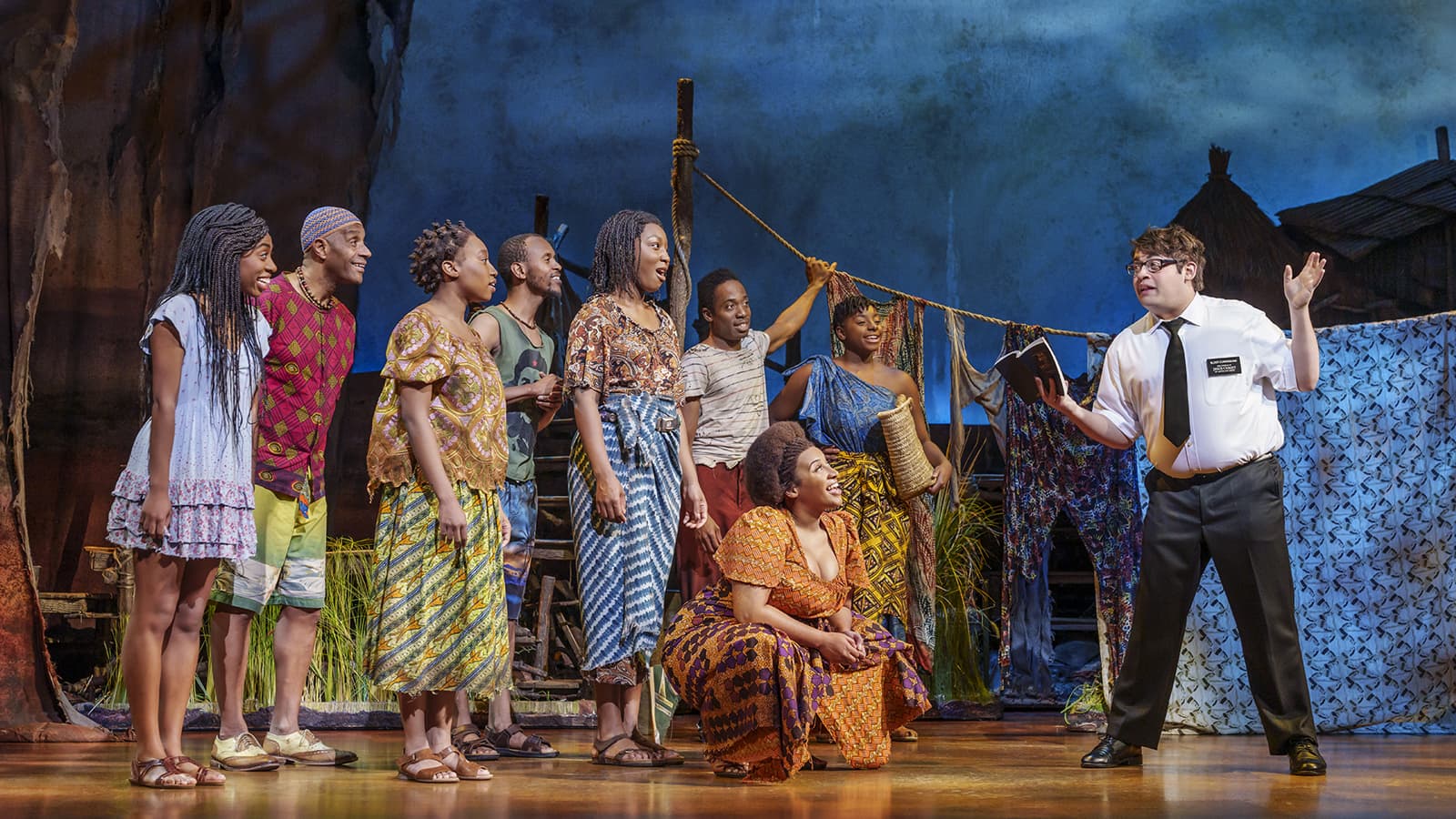 The Book of Mormon London Company. Photography by Johan Persson.