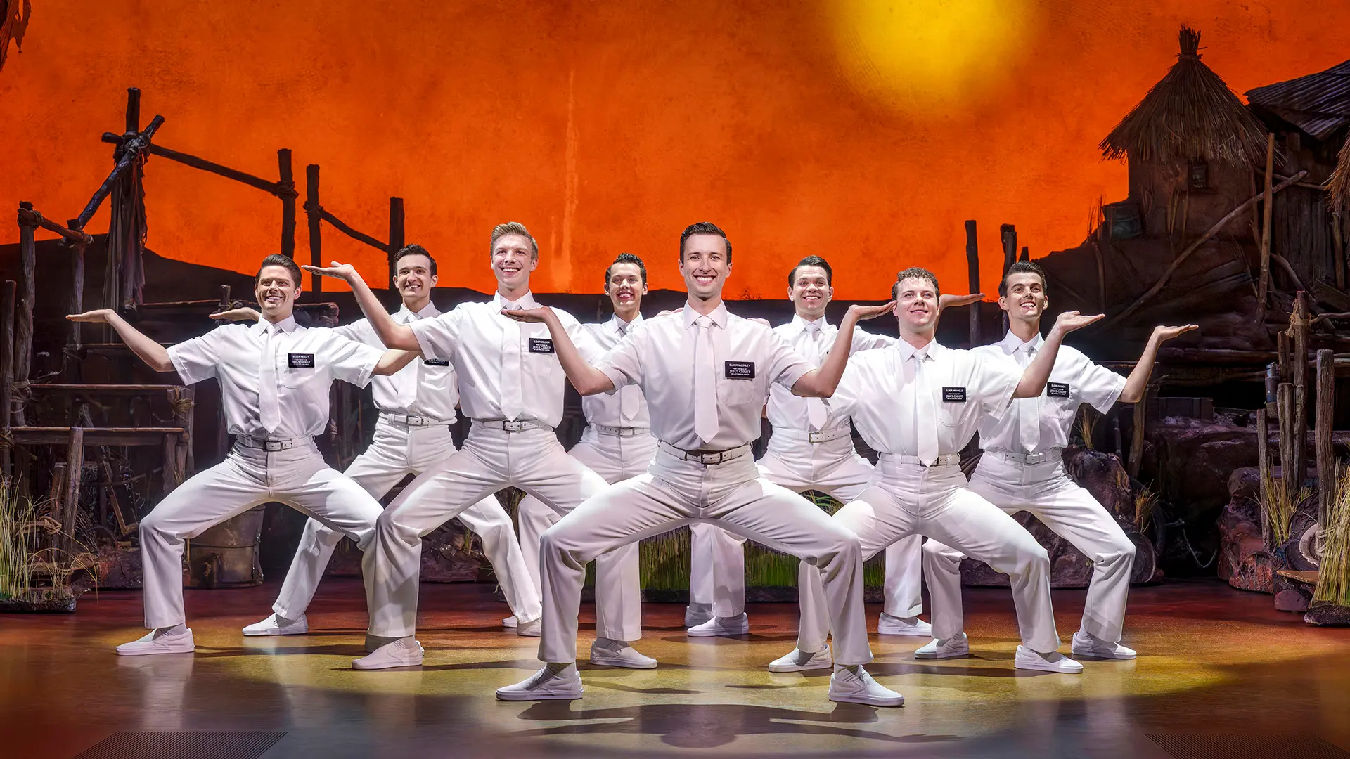 The Book of Mormon London Company. Photography by Paul Coltas