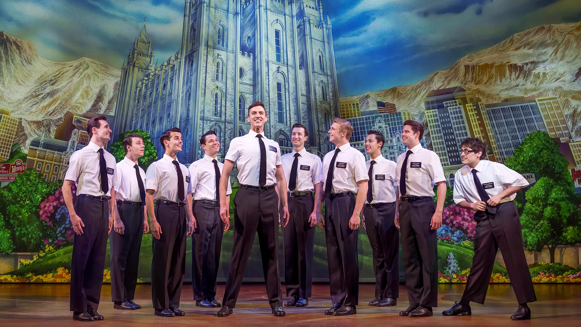 The Book of Mormon London Company. Photography by Paul Coltas