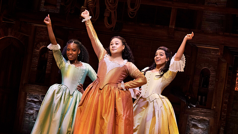 Shan Ako as Eliza Hamilton, Allyson Ava Brown as Angelica Schuyler, Roshani Abbey as Peggy Schuyler. Photo by Danny Kaan