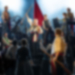 A photograph of the barricade scene from Les Miserables, including the character of Enjolrus surrounded by students.